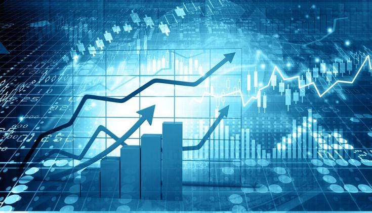 Financial data visualization showing upward trending graphs and market analysis charts in blue tones.